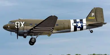 A plane with the tail section up and the wing is bent.